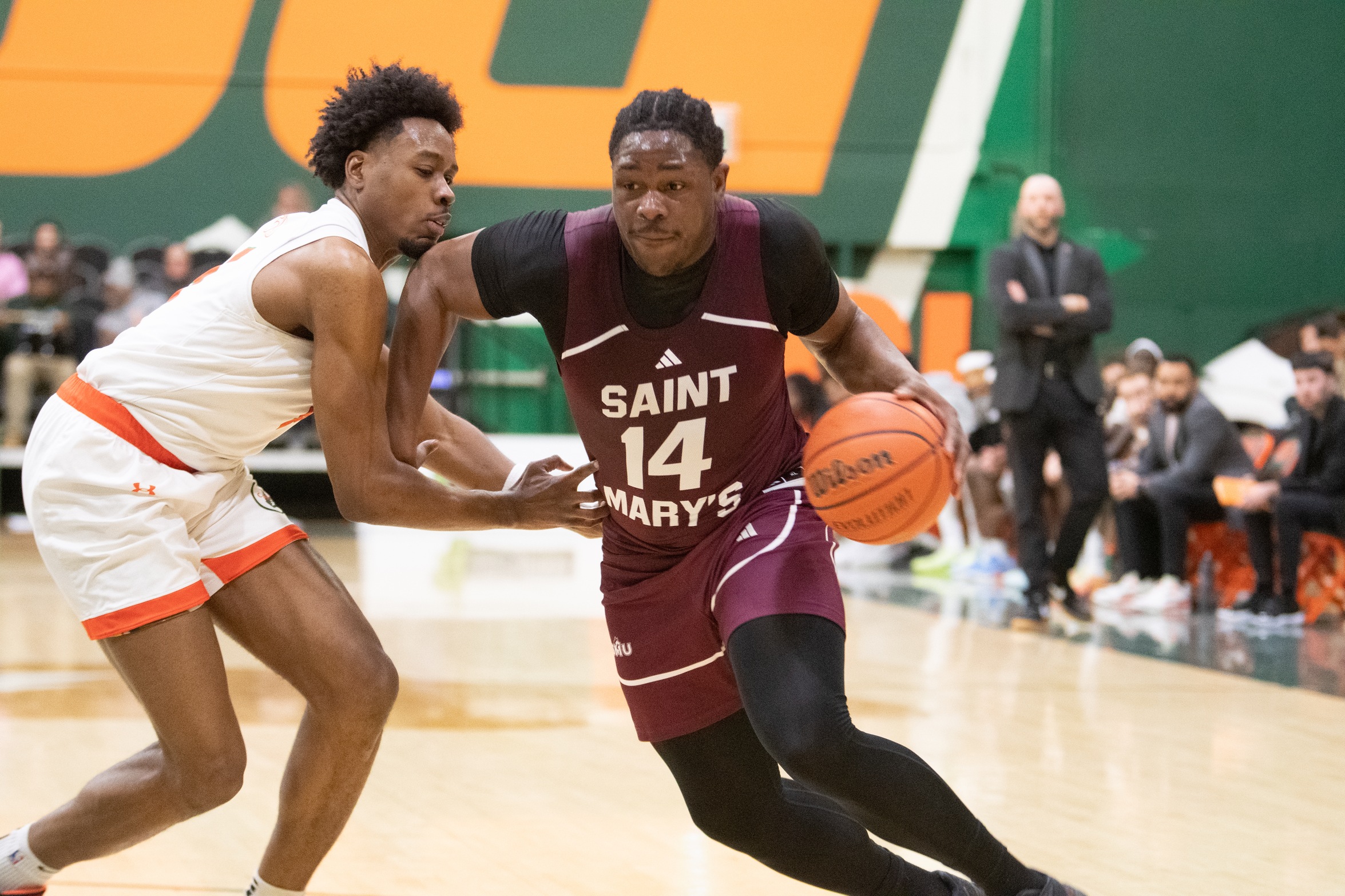 White's double-double powers Huskies to 87-74 win over Capers