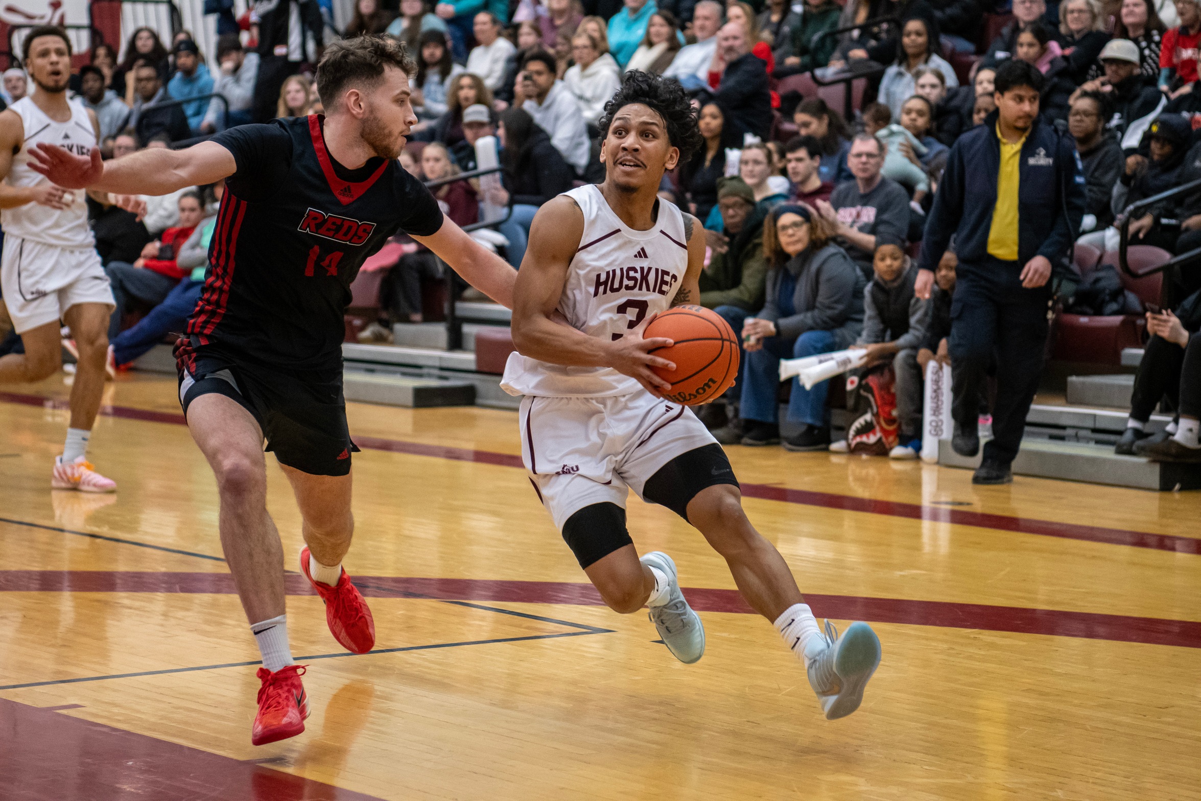 REDS edge Huskies 94-87 in OT thriller
