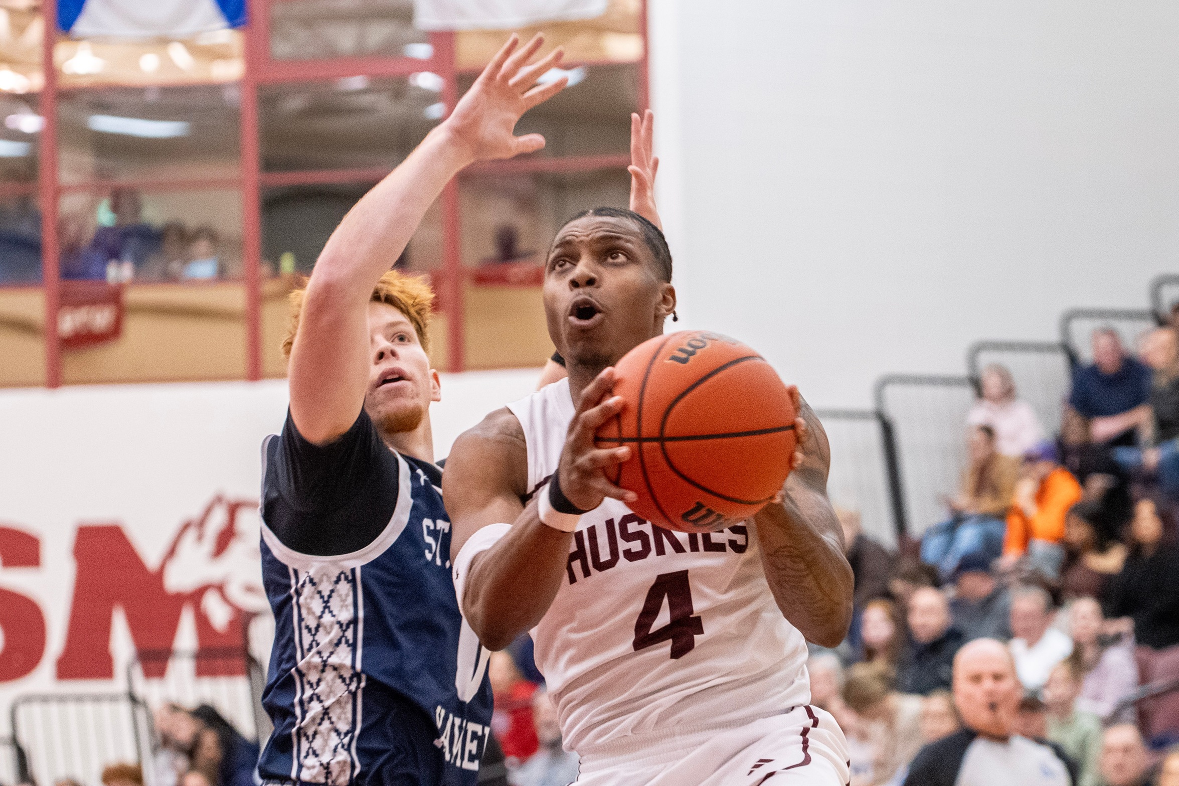Downey pours in 41 as Huskies defeat X-Men 100-86