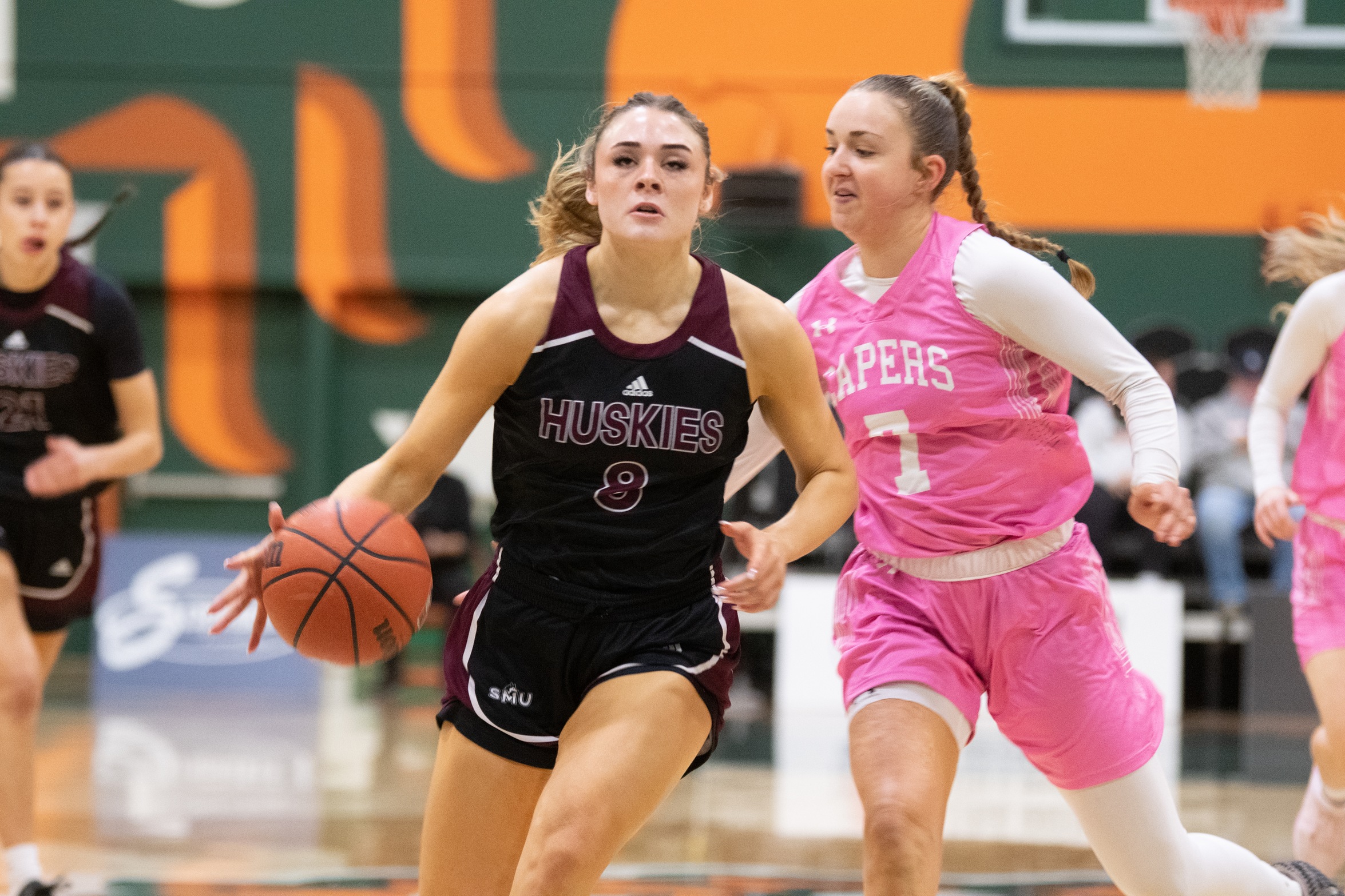 Armstrong leads Huskies to 68-63 win over Capers