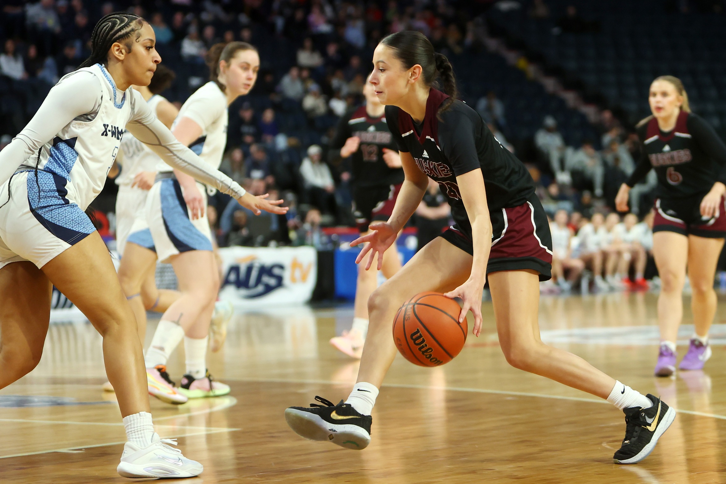 X-Women late run defeats Huskies 57-48 in AUS quarterfinal